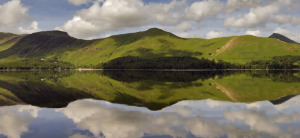 Catbells seen from the East shore of Derwentwater, with cloud reflections in the water, Cumbria