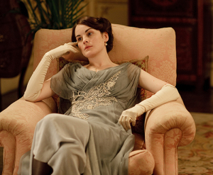The real-life equivalents to Lady Mary would never stoke their own fire. Image courtesy of PBS.