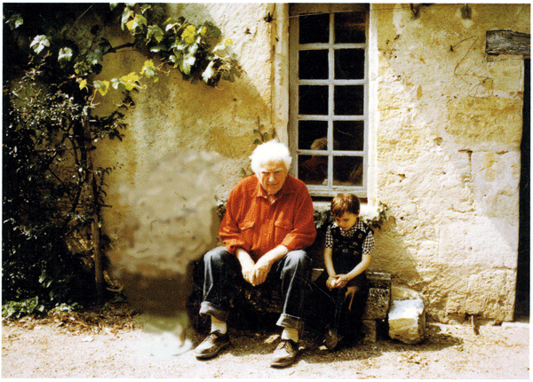 Alexander Calder sitting with Eric Mourlot