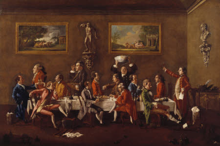 Oil painting on canvas, A Punch Party by Thomas Patch (1725 - 1782), signed and dated, FLORENCE 1760 PATCH PINXITand inscribed with names of sitters. A Punch Party with Sir H. Mainwaring; Earl Cowper; Viscount Torrington; Reverend J. Lipyeatt; Lord Grantham; Sir Brook Bridges, Bt; James Whyte; Jacob Houblon; the Earl of Moray; Mr CharlesHatfield, the landlord; Earl of Stamford; Charles S. Boothby; Sir John Rushout Bt, and Sir Charles Bunbury, Bt. The 5th Earl of Stamford is seen with his friends enjoying an evening at Mr Hadfield's inn called Carlo's near Snato Spirito inFlorence. The artist has introduced a caricature bust of himself on the wall on the right, with thers of a faun. Fourteen figures are depicted, engaged in various activities round a table, for example, Lord Grantham is carrying a pedlar's tray filled with cameos from which Lord Stamford, because he wears it on his finger, has evidently acquired one; but principally they are engaged in drinking the punch provided by the patron Charles Hadfield.On the back wall are paintings of Bacchus and of Silenus in chariots pulled by leopards and tigers respectively; on the wall at the right is a caricature bust of the artist with the ears of a faun, perhaps echoing the replica of the Dancing Faun on the adjacent wall, the original of which is in the Uffizi. The socles on which the sculpture is placed are decorated with the Medici arms.