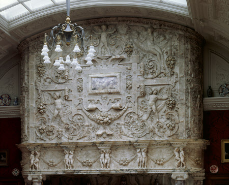 The double-storey chimneypiece surmounting the inglenook in the Drawing Room at Cragside, made of Italian Marble. National Trust Images
