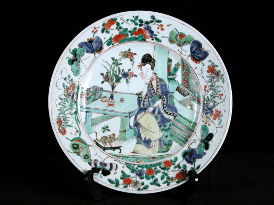 Chinese porcelain plate decorated with a lady seated at a table, her head resting in her hand, c. 1690-1720, collection of Captain George Francis Warre, given to the National Trust by Mrs. George Warre, 1961, at Dudmaston, NT 813530. ©National Trust/Claire Reeves