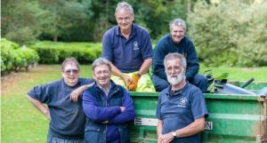 Alan Titchmarsh with the garden volunteers at Fountains Abbey 
