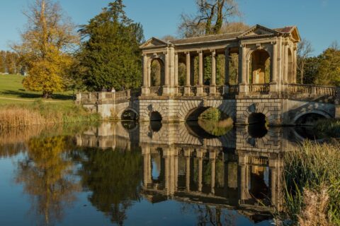 The Palladian Bridge in autumn at Stowe, Buckinghamshire ©National Trust Images/Hugh Mothersole