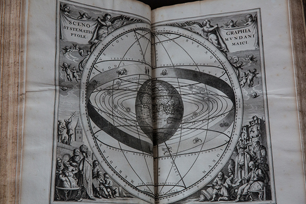 A plate from the spectacularly illustrated star atlas Harmonia macrocosmica (1661), which explores the movements of the earth and planets. © National Trust / Red Zebra Photography