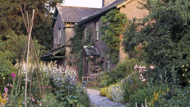 Herbaceous borders along the path leading to the front porch at Hill Top Farm of Beatrix Potter fame. ©National Trust/Stephen Robson