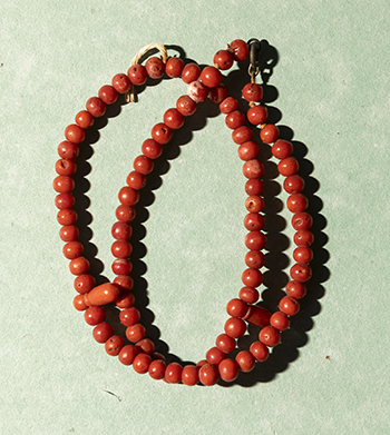 A string of coral prayer beads, given to given to Vita when she and Harold were invited to dine with the Il-Khan, the supreme chief of the Bakhtiari Tribe ©National Trust Images/James Beck
